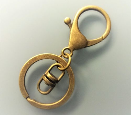 Mousqueton porte clé métal coloris bronze