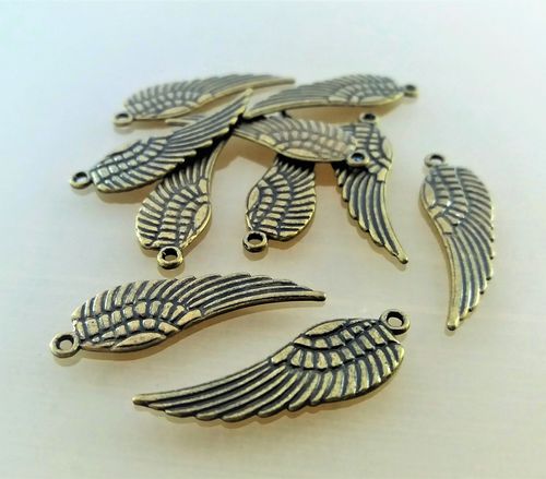 10 pendentifs ailes 3cm métal coloris bronze