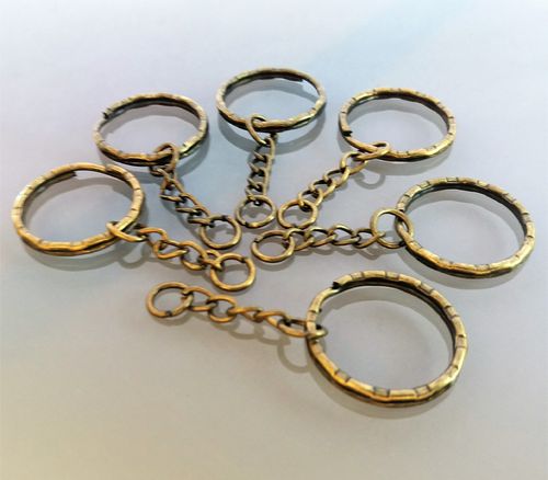 6 porte-clés anneaux métal coloris bronze