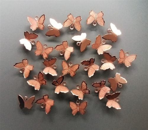 25 breloques papillons métal coloris cuivre