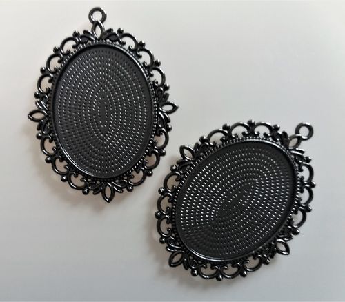 2 pendentifs noirs cabochons 40 mm X 30 mm