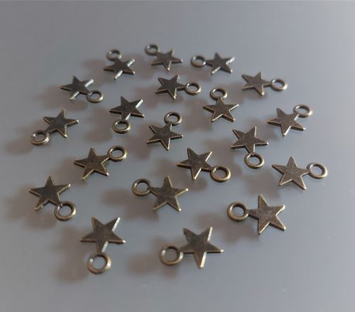 20 breloques étoiles 8 mm métal coloris bronze